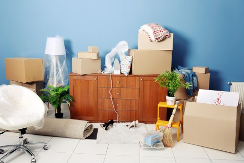 Professional packing materials and boxed household items for a Clapham move