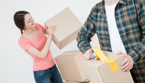 Man with van loading boxes for a Clapham home move