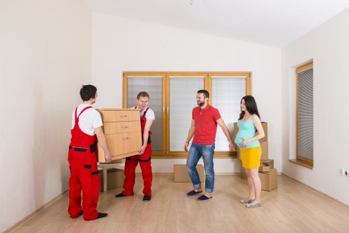 Local movers handling bulky household furniture in Clapham