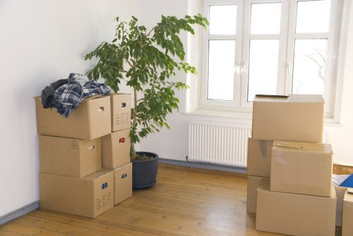 Packed moving boxes and furniture for a Clapham home relocation