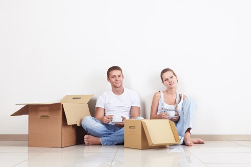 Business furniture and boxes prepared for an office move near Clapham